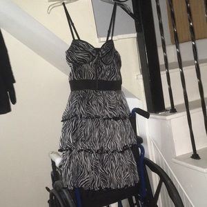 Knee length short zebra printed dress with ruffles